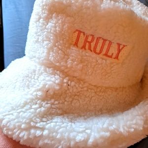 A white truly fluffy hat.